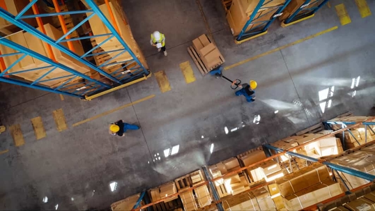 The inside of a busy warehouse from above